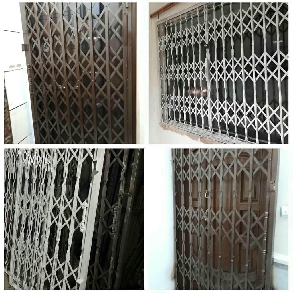حفاظ آکاردئونی درب واحد مسکونی با تسمه فولادی مقاوم
