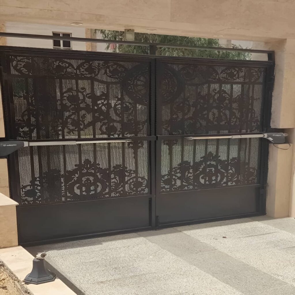 ساخت سیستم جک بازویی درب پارکینگ برای درب دو لنگه