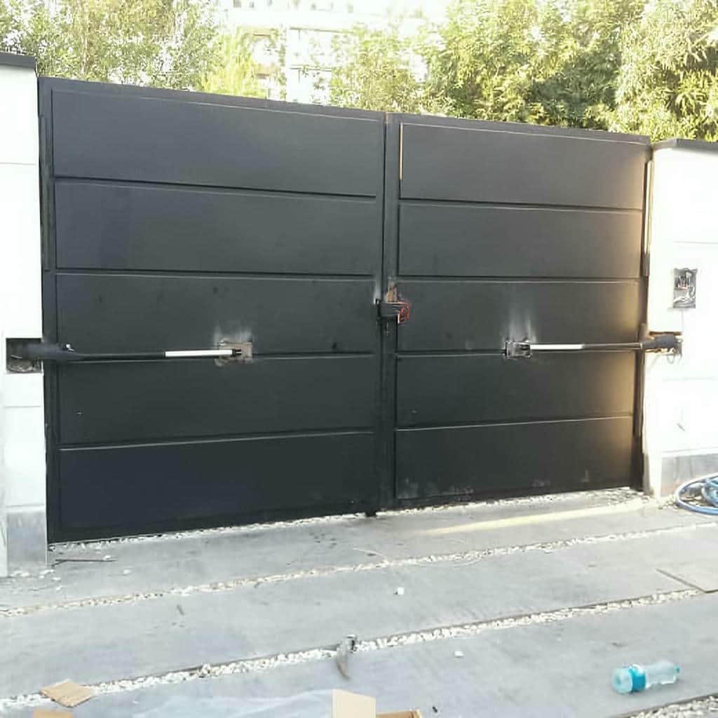درب پارکینگ جک دار بازویی با حرکت نرم و ریموت کنترل