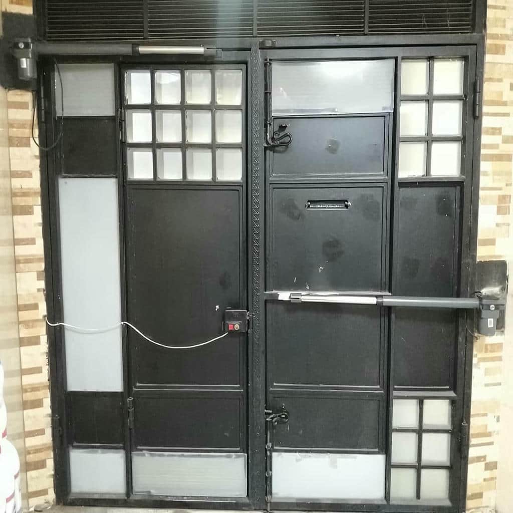 جک پارکینگی درب دو لنگه ساختمان